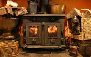 Is cast iron or steel better for a wood-burning stove?